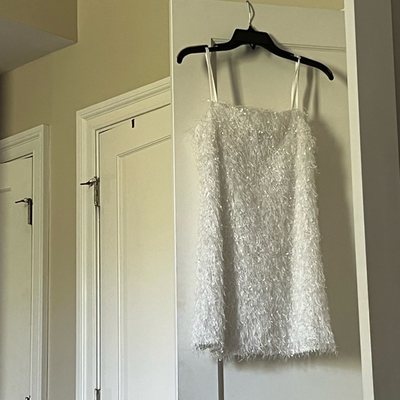 White tassel mini dress with satin adjustable straps. - Picture 1 of 2